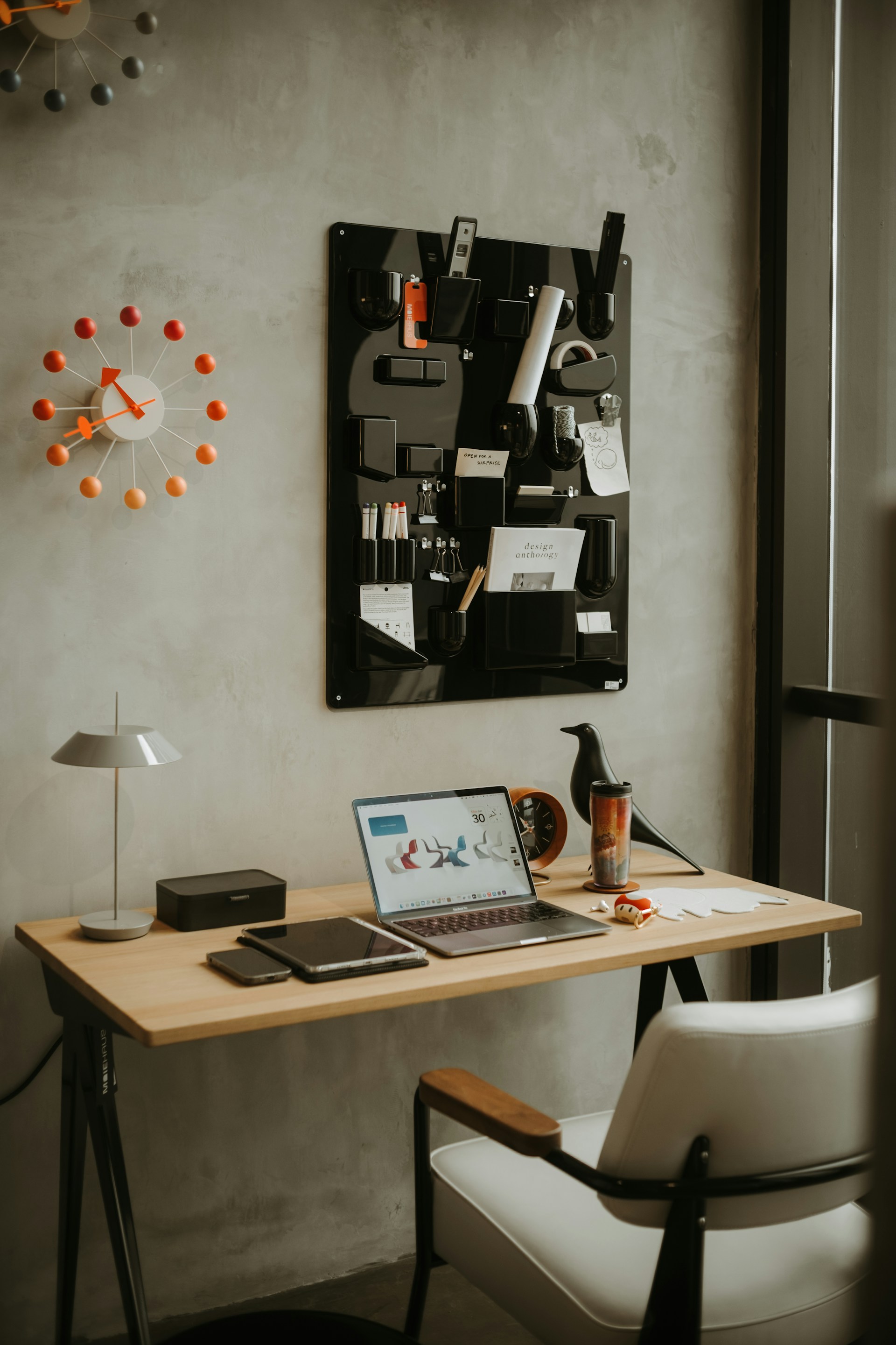 Organized workspace with a laptop and desk accessories
